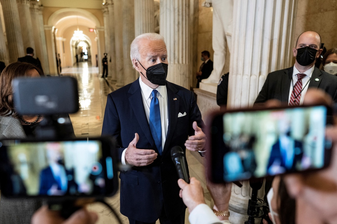 Biden takes questions from reporters